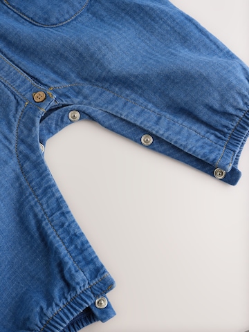 Ensemble Next en bleu