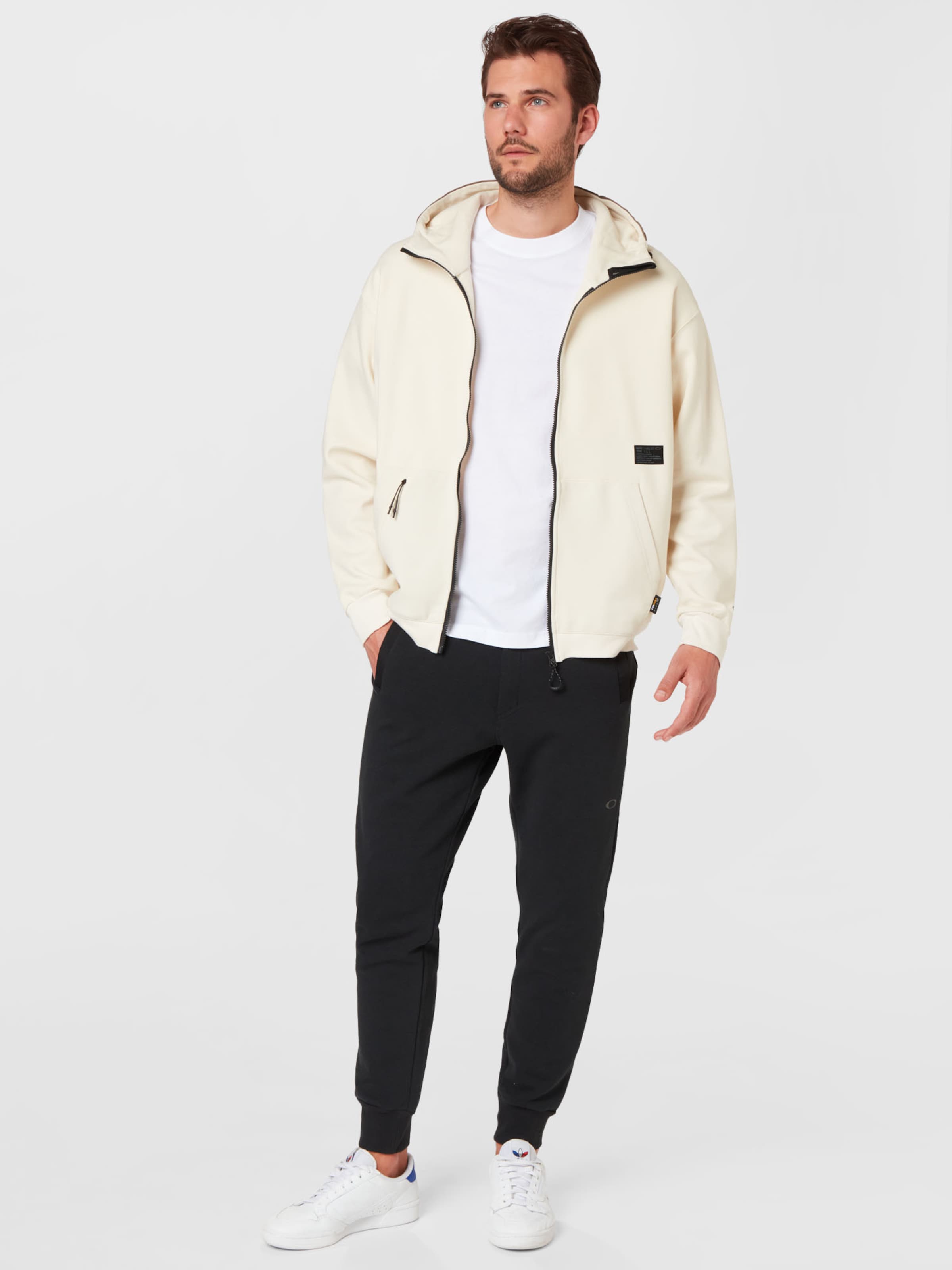 Männer Sportbekleidung OAKLEY Sportsweatjacke in Hellbeige - XV04681 Männer Sportbekleidung OAKLEY Sportsweatjacke in Hellbeige - XV04681