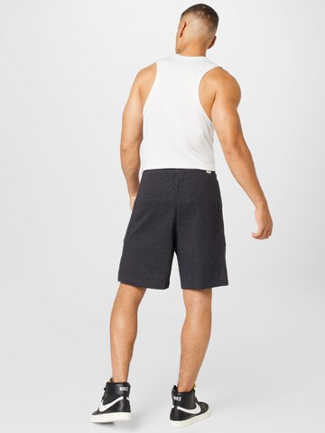 Nike Sportswear tavaline Püksid 'REVIVAL', värv must