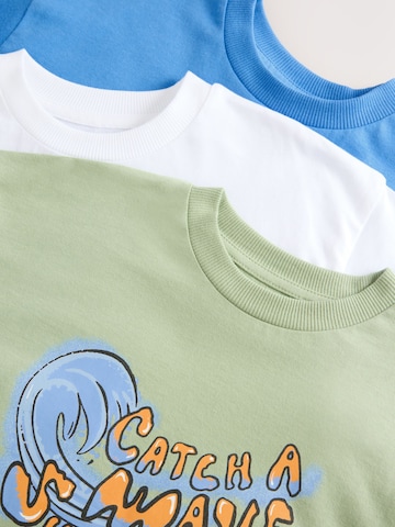 T-Shirt Next en bleu