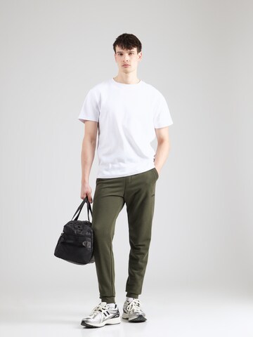 BJÖRN BORG Конический (Tapered) Спортивные штаны 'ESSENTIAL 4' в Зеленый