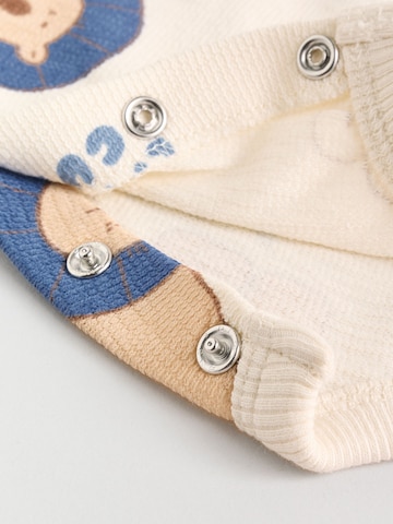 Set Next en bleu
