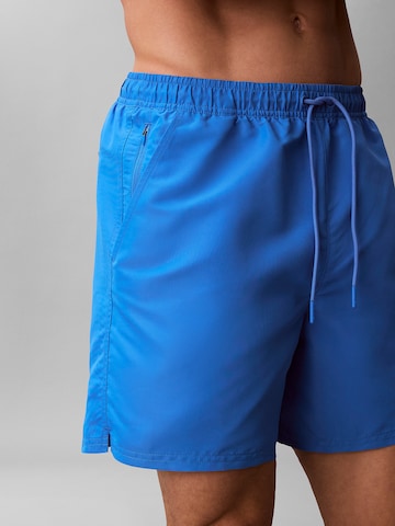 Regular Shorts de bain Calvin Klein Swimwear en bleu