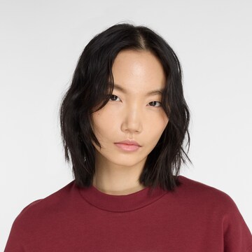 Sweat-shirt 'Essentials' new balance en rouge
