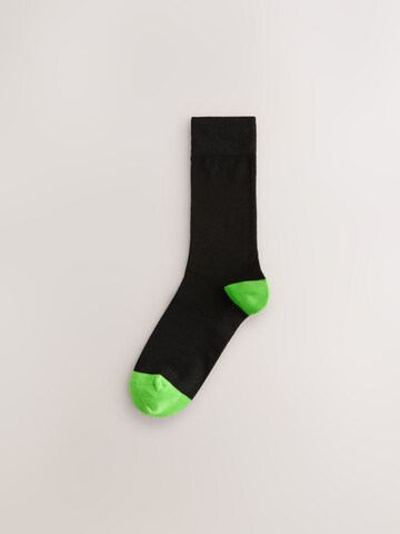 Next Nogavice | črna barva