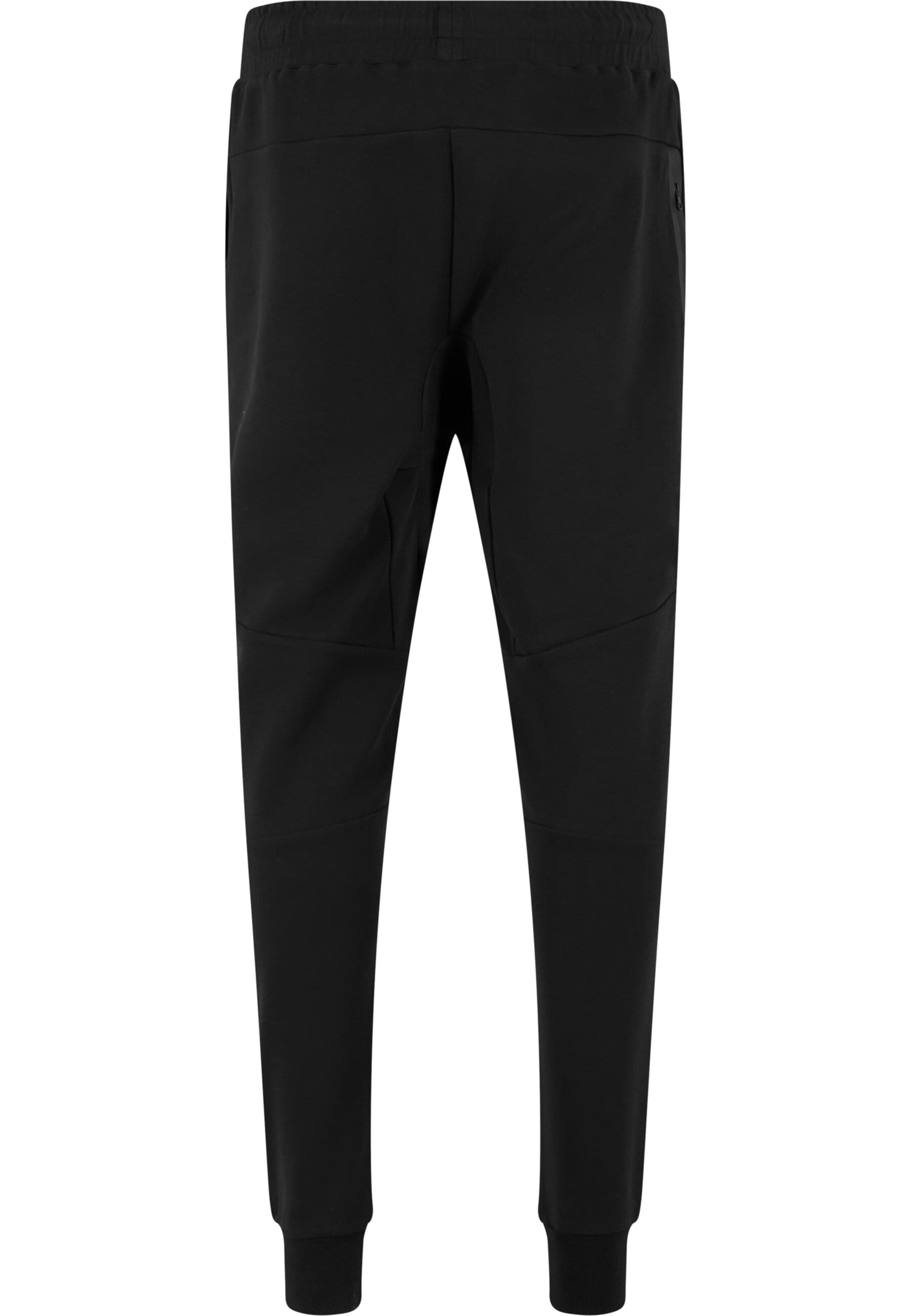 Tapered Pantaloni di Mister Tee in nero