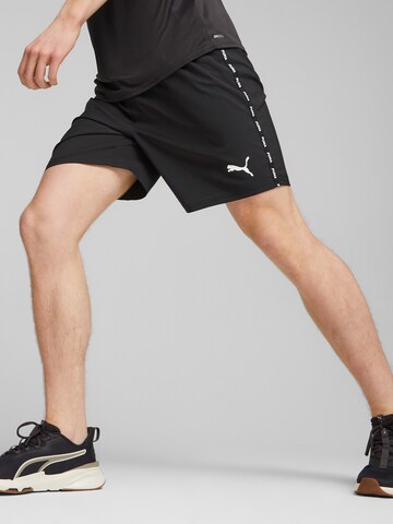 Regular Pantalon de sport PUMA en noir : devant