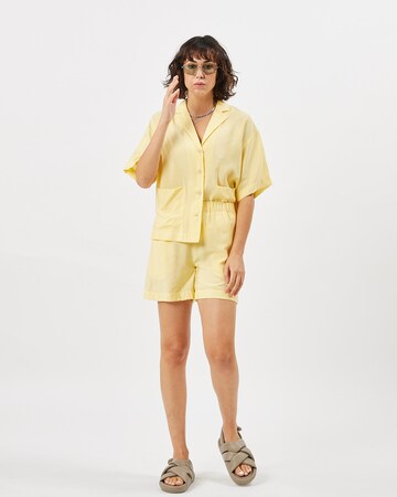 minimum Loose fit Trousers 'Acazia' in Yellow