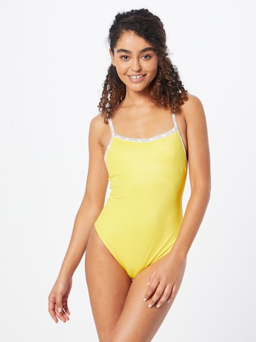 Calvin Klein Swimwear صدرية ثوب السباحة بلون أصفر: الأمام