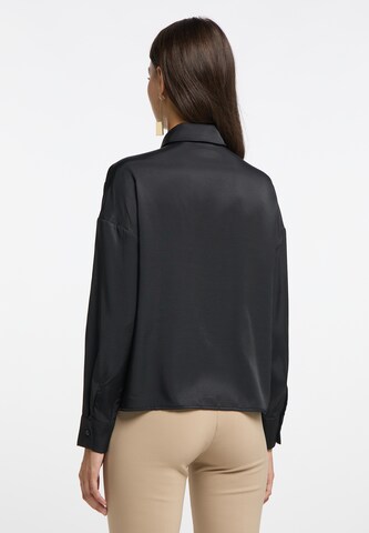 RISA - Blusa en negro