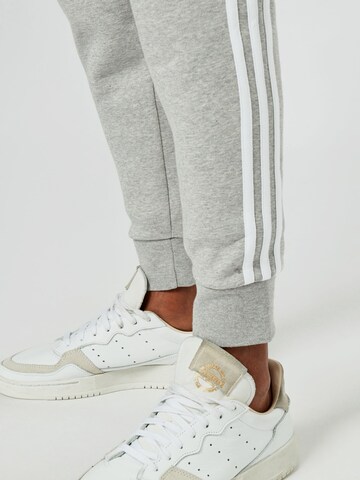 ADIDAS ORIGINALS Tapered Pants 'Adicolor Classics 3-Stripes' in Grey