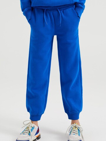 WE Fashion Tapered Broek in Blauw: voorkant