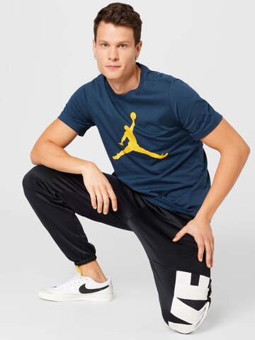 Jordan Bluser & t-shirts i blå