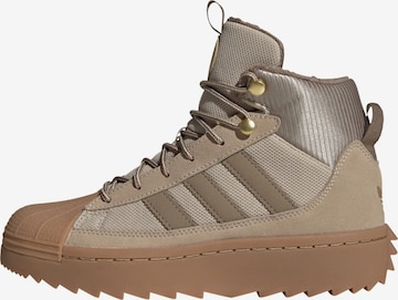 ADIDAS ORIGINALS - Bota 'Superstar' em verde: frente