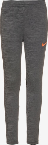 NIKE Skinny Workout Pants in Grey: front