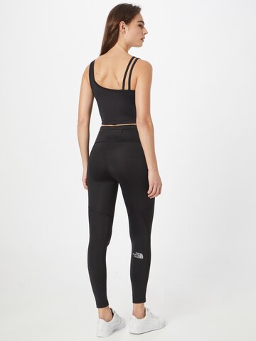 Skinny Pantalon de sport THE NORTH FACE en noir