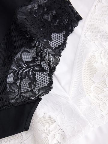 Slip scultant Next en noir