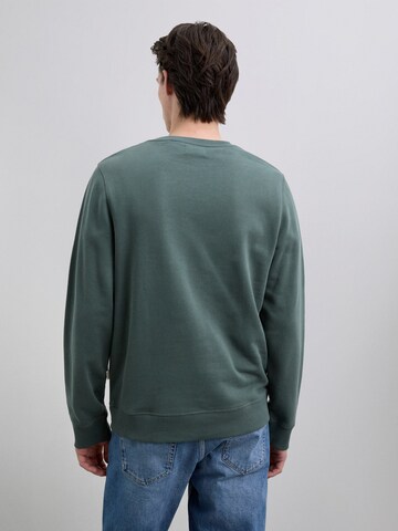 Sweat-shirt ' ' Scalpers en vert