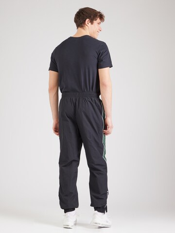 Loosefit Pantalon 'AIR' Nike Sportswear en noir