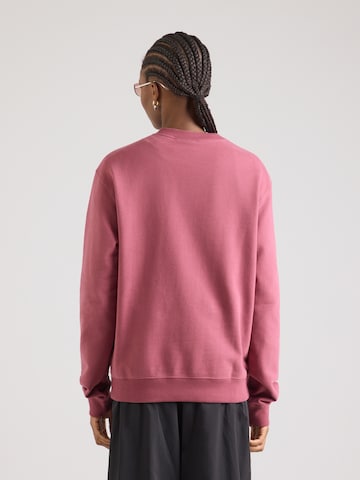 Nike Sportswear - Sudadera 'Studio' en rosa