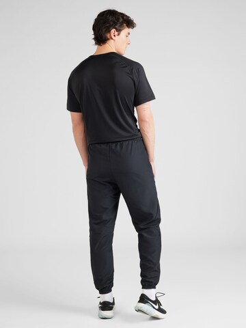 NIKE - Tapered Calças de desporto 'Academy' em preto