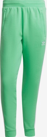 ADIDAS ORIGINALS Pants in Green: front