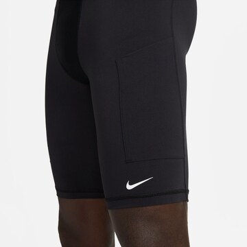 NIKE Skinny Sportbroek 'A.P.S.' in Zwart