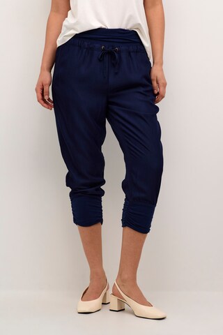 Cream Tapered Harem trousers in Blue: front