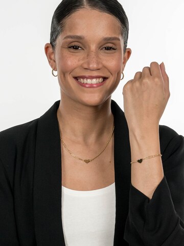 Suri Frey Armbånd i guld: forside