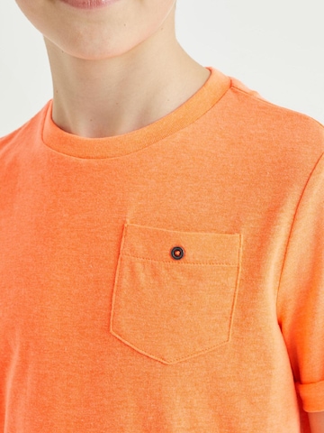 T-Shirt WE Fashion en orange