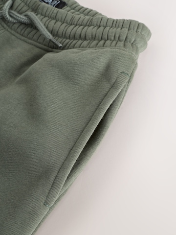 Next Ozke Hlače | zelena barva