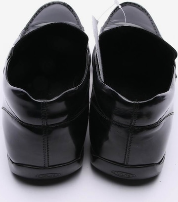 Tod's Flats & Loafers in 43 in Black