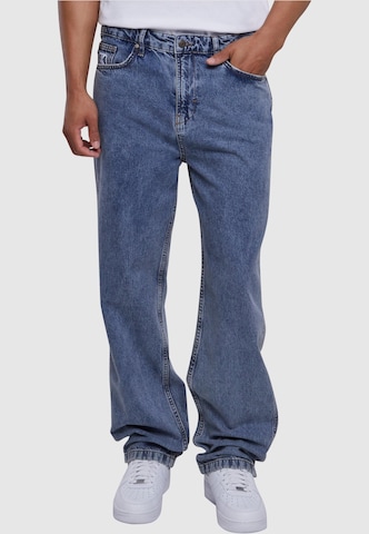 Karl Kani Flared Jeans in Blue: front