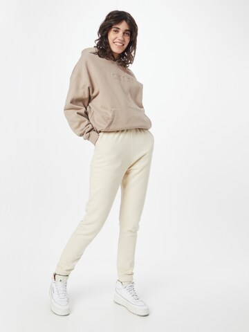 Effilé Pantalon de sport aim'n en beige