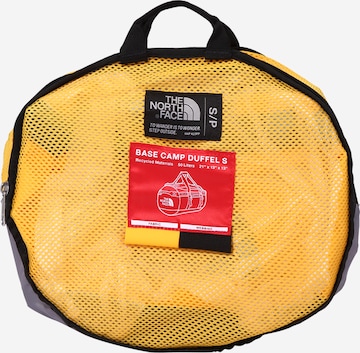 THE NORTH FACE - Mala de viagem em amarelo