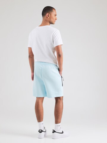 Nike Sportswear - Loosefit Pantalón 'TCH FLC' en azul