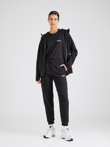 Hummel Tapered Sporthose 'Tech Fleece' in Schwarz