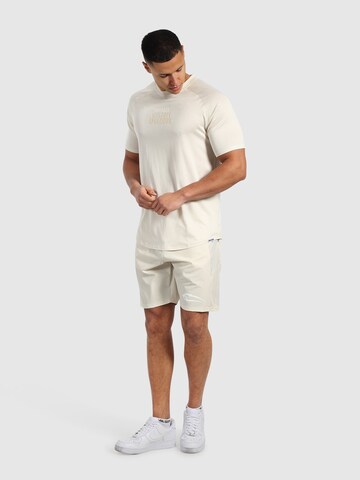 T-Shirt ' Powerfit Triple ' Smilodox en blanc
