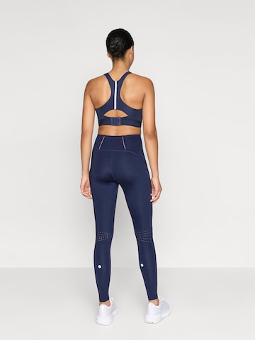 ASICS Skinny Workout Pants 'ROAD' in Blue