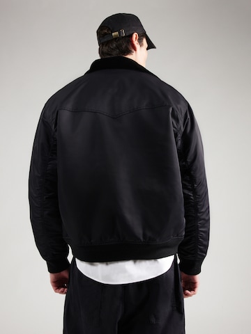 Carhartt WIP Prehodna jakna 'Santa Fe Alumni' | črna barva
