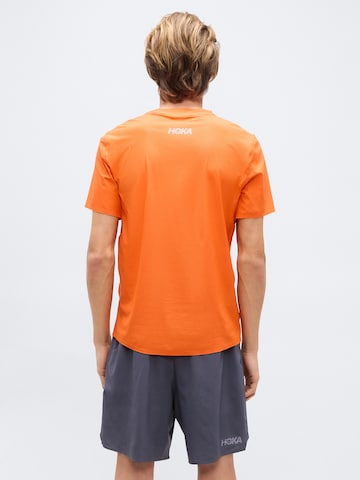 HOKA - Camiseta funcional 'AIROLITE 2.0' en naranja