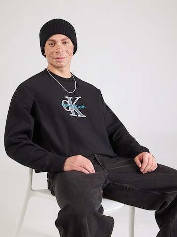 Calvin Klein Jeans Μπλούζα φούτερ σε μαύρο: μπροστά