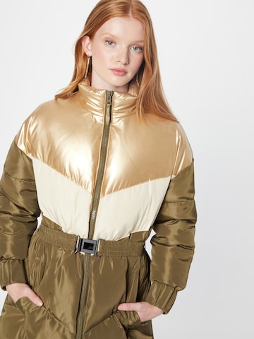 Manteau mi-saison co'couture en vert