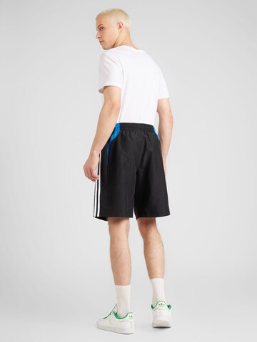 ADIDAS ORIGINALS Loosefit Housut värissä musta