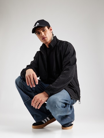 Veste mi-saison 'Teamgeist Adicolor' ADIDAS ORIGINALS en noir