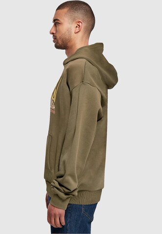 Merchcode Sweatshirt 'Spring - Grow through 2' in Groen