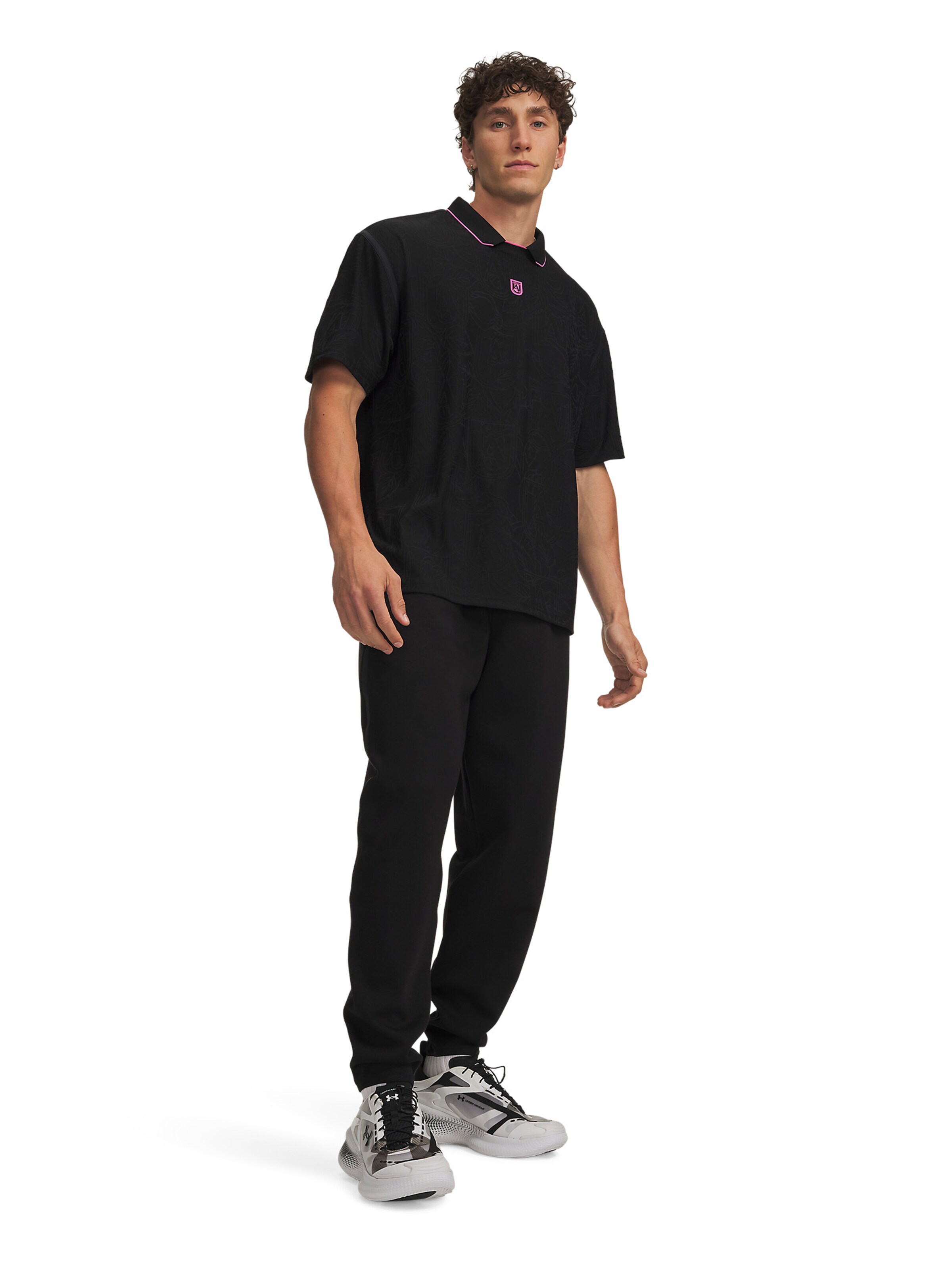 UNDER ARMOUR Tapered Sportbroek 'Unstoppable' in Zwart