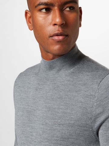 Calvin Klein - Pullover em cinzento