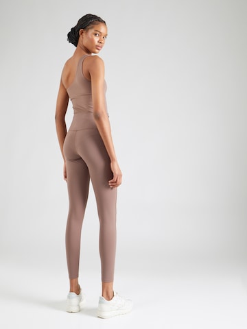 Girlfriend Collective Skinny Workout Pants in Brown