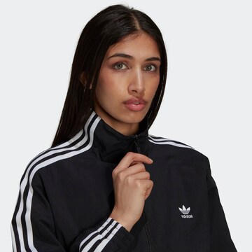 ADIDAS ORIGINALS Between-season jacket 'Adicolor Classics Lock-Up' in Black